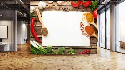 Blank recipe book with vegetables on wooden table Wall mural