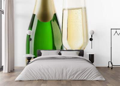 Champagne bottle with glass on white background Wall mural