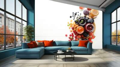 Glass jars with different kinds of jam and berries on wooden table Wall mural