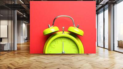 Green alarm clock on a red background Wall mural