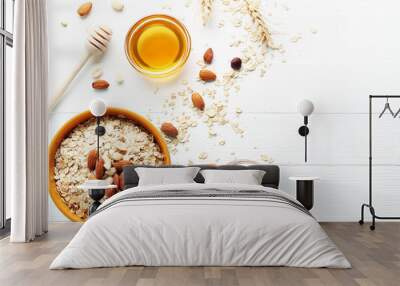 Oatmeal in bowl with nuts on white wooden table Wall mural