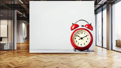 Red alarm clock on grey background Wall mural