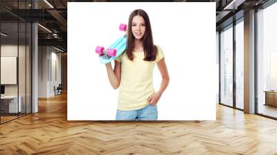 Young girl with skateboard on white background Wall mural