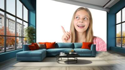 Young smiling girl with dental braces on white background Wall mural