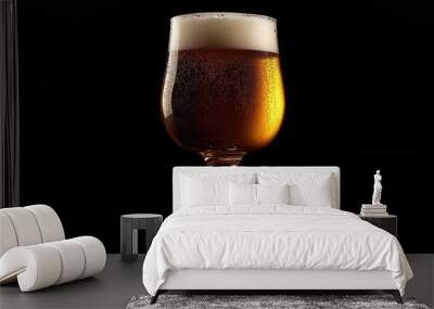 A beer glass filled to the brim, placed against a black backdrop, capturing the rich color and texture of the drink. Wall mural