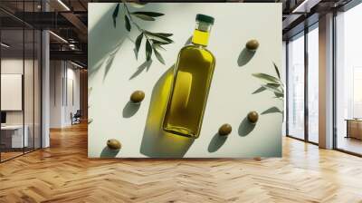 A bottle of organic olive oil with olives scattered around, representing health, nutrition, and the benefits of natural ingredients. Wall mural