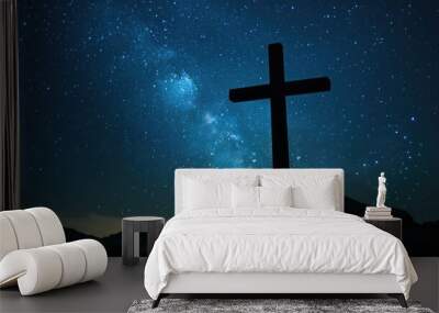 A cross silhouetted against the night sky, with stars twinkling in the background, symbolizing hope and faith in the darkness. Wall mural