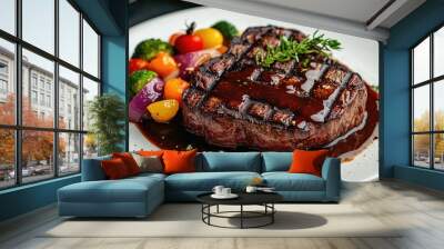 A juicy grilled beef steak, drizzled with a rich sauce and served with colorful vegetables Wall mural