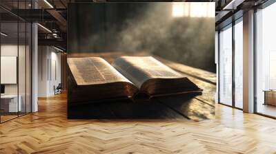 An antique Bible sits open on a wooden table, with sunlight and fog creating a quiet, contemplative environment. Wall mural