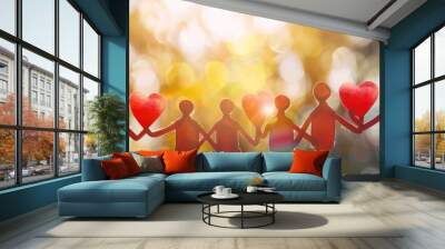 Diverse figures holding hands and hearts in an abstract charity concept, showcasing compassion and community support. Wall mural