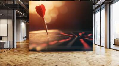 Red dart perfectly hitting the target on a dartboard, with a double exposure of a rising stock graph and line chart, representing successful business growth Wall mural