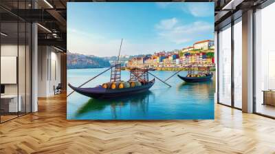 Scenic Porto city and Douro River with traditional wine barrel boats, viewed from the famous Marginal de Gaia riverfront Wall mural