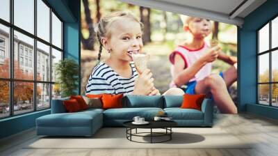 Kids eating ice cream on hot summer day on tropical vacation. Wall mural