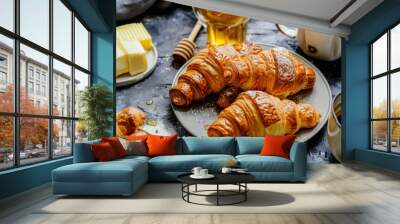 French croissants with honey, butter and cup of coffee for breakfast. Wall mural