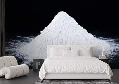 Heap of tapioca starch on a black background, dry cassava root. Wall mural