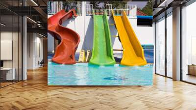 colorful slider beside swimming pool Wall mural