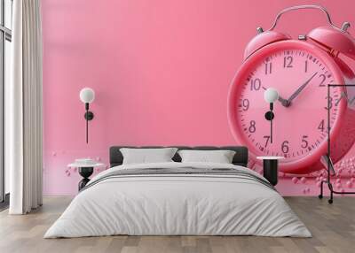 Pink Alarm Clock on a Pink Background Wall mural