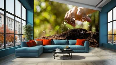 Earthworm fertilizer to nourish the plants and there is a technology icon about soil elements around it. Wall mural