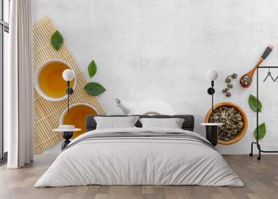 Asian tea set with white teapot and two cups, top view Wall mural