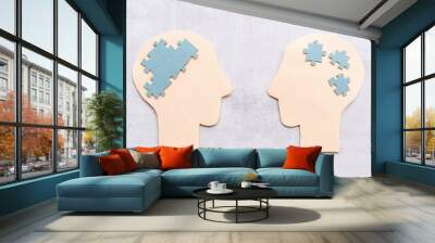 Brain puzzles on two human heads. Communication and connection concept Wall mural