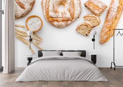 Bread shop. Baker's shop. Assorted bread on white background top view space for text Wall mural