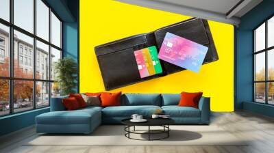 business with credit cards and wallet on office desk yellow background top view Wall mural