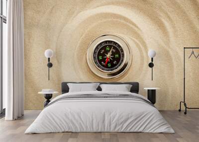 Compass in the sand. Best solution or direction concept Wall mural