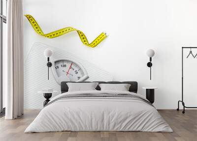 Diet concept with scale and measuring tape for weight loss on white background top view mock up Wall mural