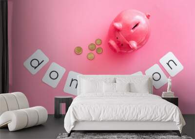 Donation concept. Piggy bank and coins on pink background top-down Wall mural