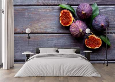 Fresh purple fig fruit with leaves. Close up Wall mural