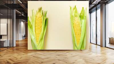 Fresh yellow corn on the cob, top view. Vegetable background Wall mural