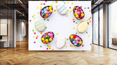 Happy Easter frame of cookies eggs and sweets, top view Wall mural