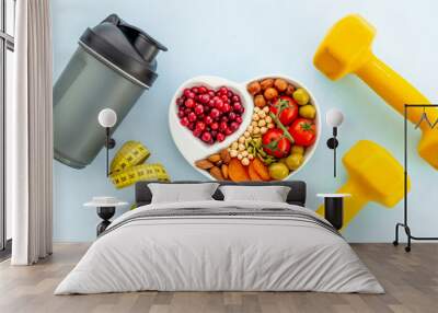 Healthy lifestyle and nutrition eating concept. Food with sports fitness equipment Wall mural