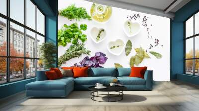 natural oil and fresh greenery for restaurant cooking on white kitchen table background top view Wall mural