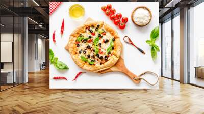 Pizza with tomato, basil, olives, cheese on white background top view Wall mural