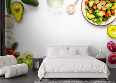 Preparing fresh salad. Vegetables, greens, spices on white background top view copy space frame Wall mural