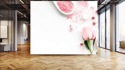 Products for skincare based on rose oil. Cream, lotion, spa salt on white background top view copyspace Wall mural