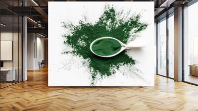 Splash of spirulina algae powder on white background, top view Wall mural