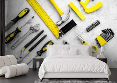 Various repair tools. Must-have for men. Equipment for building. Repair tool kit. Grey background top view pattern Wall mural