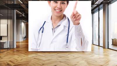 female doctor pointing one finger up Wall mural