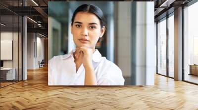 Worried South asian office worker woman thinking or planning Wall mural