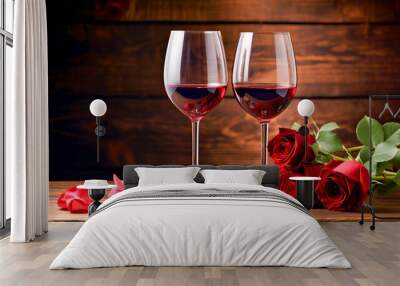 valentines day gift, two glasses of red wine and roses on a wood table background Wall mural