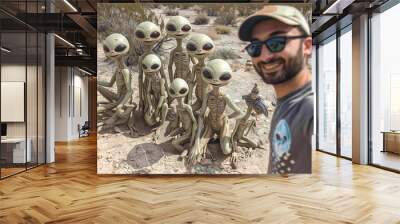 Happy guy taking selfie with group of aliens. Wall mural