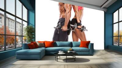 beautiful fitness young sporty couple with dumbbell Wall mural