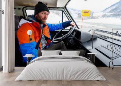 Interior view of delivery man driving a van or truck. Wall mural