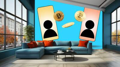 Close up of two cell phones with transaction of bitcoins between those. Blue background. Concept of cryptocurrency and e-commerce Wall mural