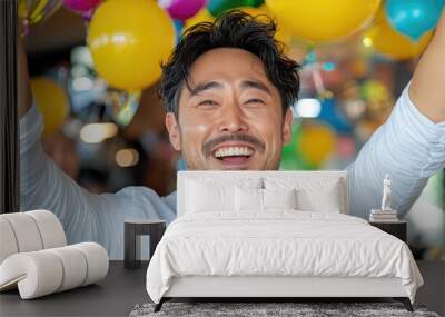 Asian Male Celebrating Joyfully at a Festive Event Wall mural