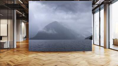 Clouds and fog at Doubtfull Sound. Fjordland New Zealand. South Island. Wall mural