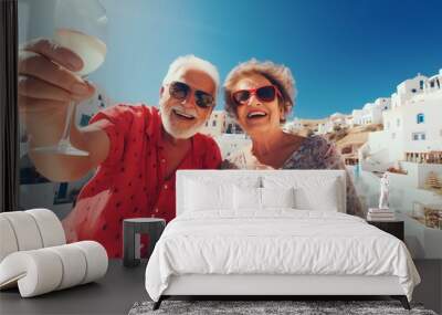 Happy senior couple drinking in Santorini Wall mural