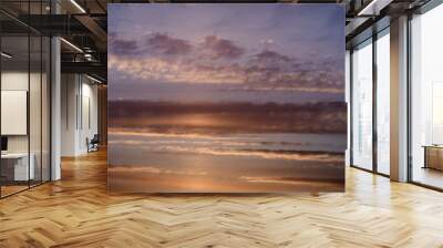 Sunset showing a full frame of sky and clouds Wall mural